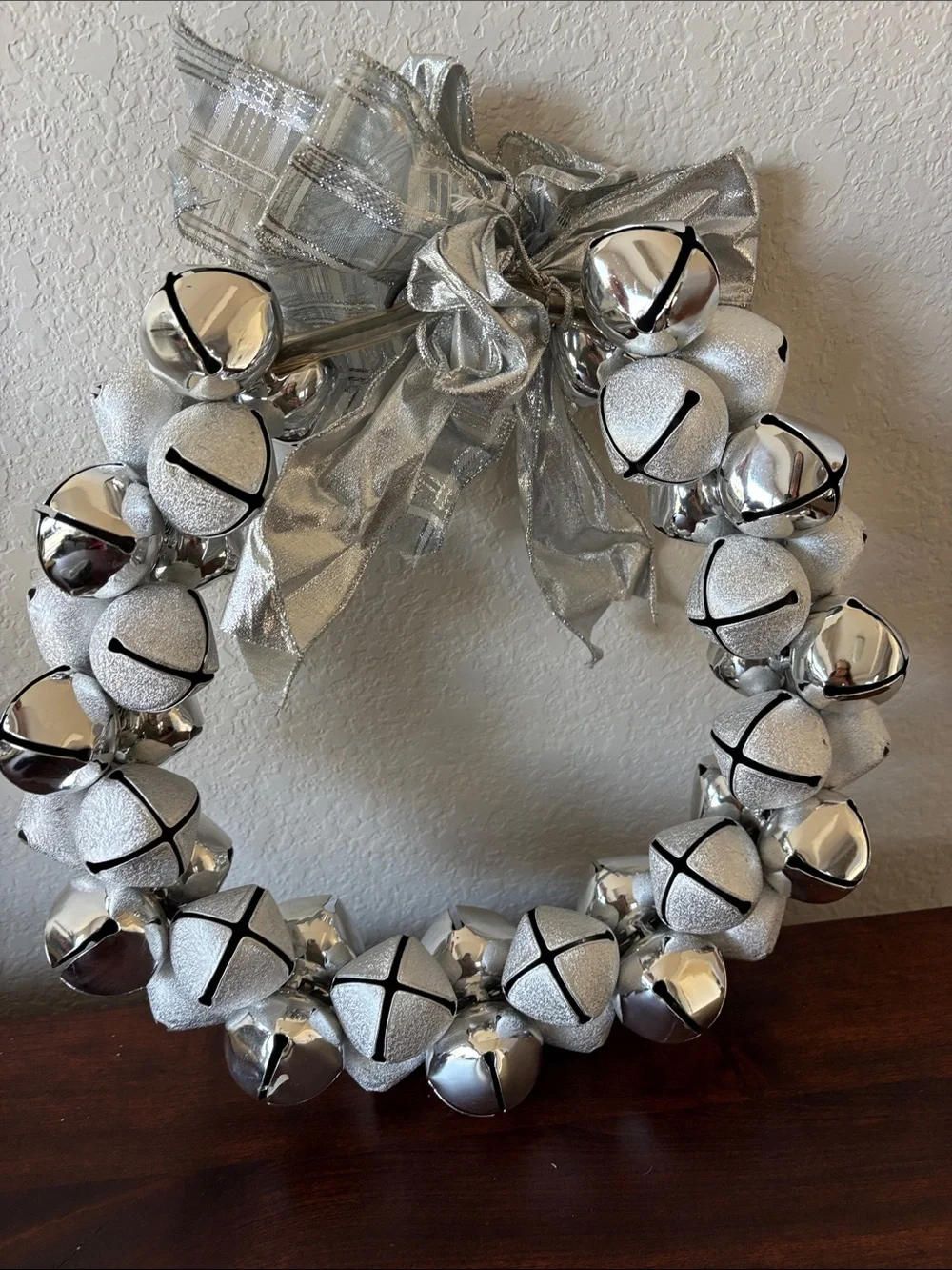 Silver Jingle Bell Holiday Wreath with Bow